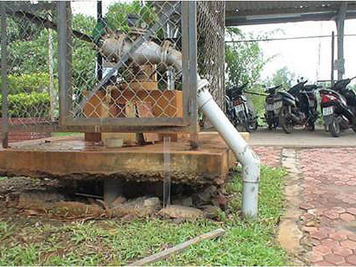 Trụ giếng khoan khai thác nước ngầm trong KCN Tân Tạo, quận Bình Tân. (Ảnh do Trung tâm Địa tin học - ĐHQG TP HCM cung cấp)